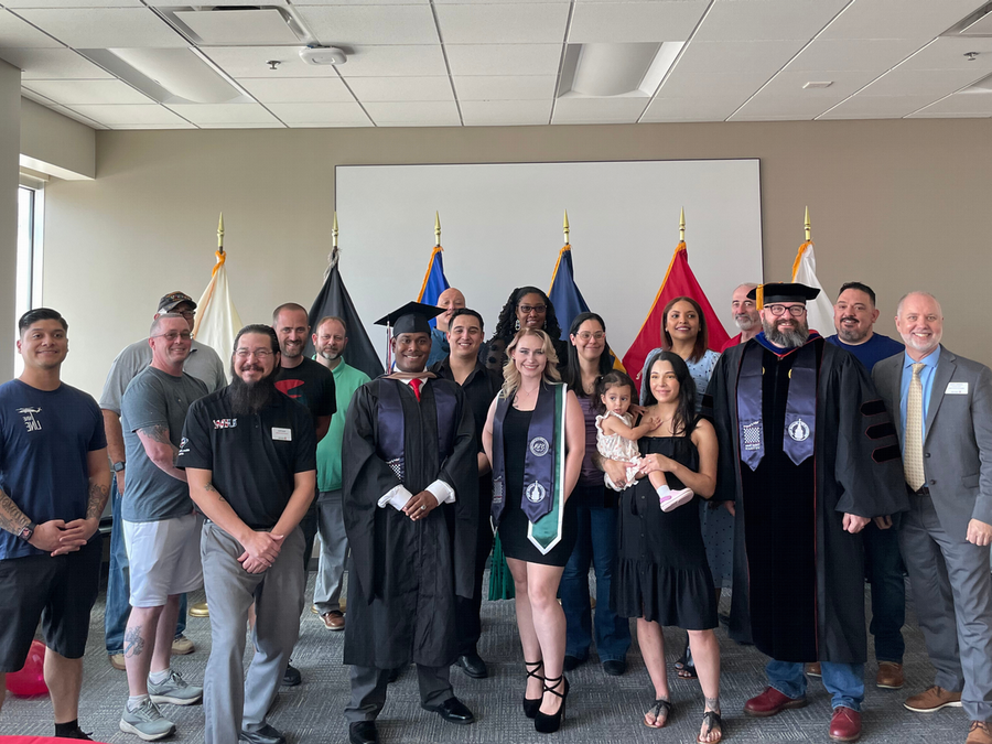 Student Veteran Graduates Posing for Picture