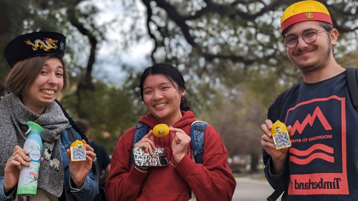 Students showing the lemons they received during Asian New Year