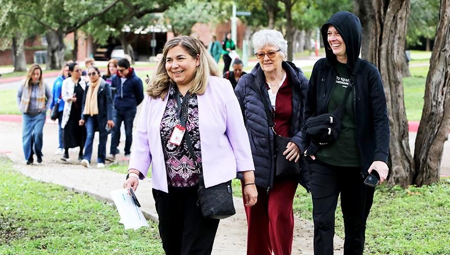 Nurses walking on campus