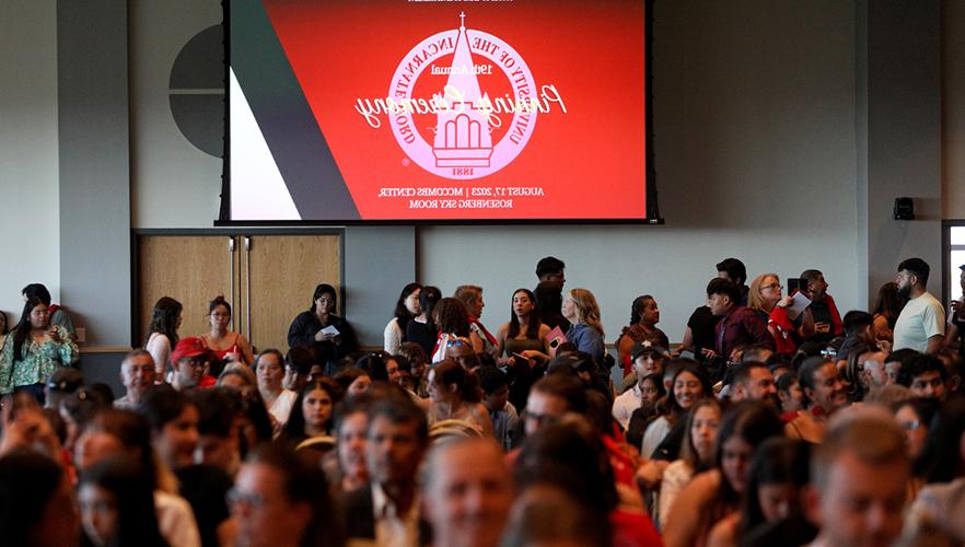 students sitting at pinning event