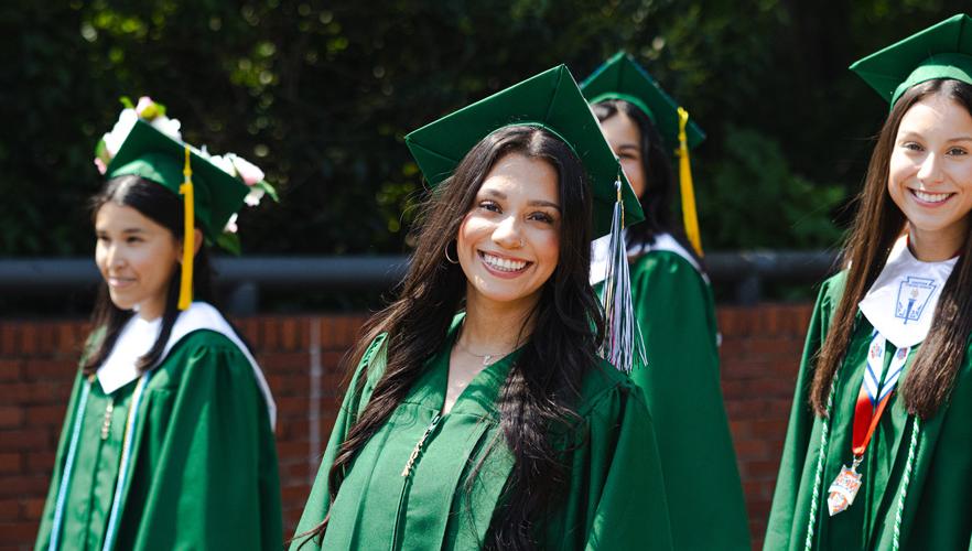 graduate smiling