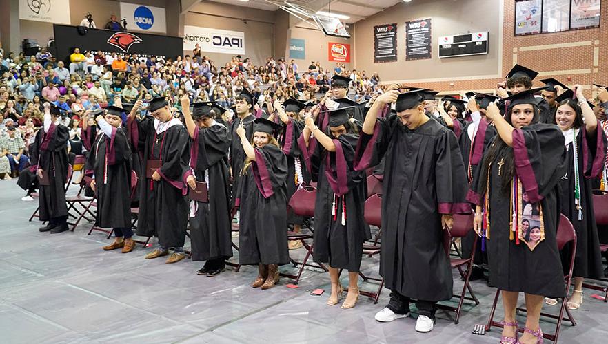 graduates with caps